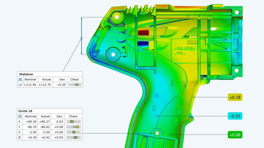 Nominal-actual comparison in ZEISS INSPECT: a plastic housing rendered as a green-to-red deviation map with measurement callouts