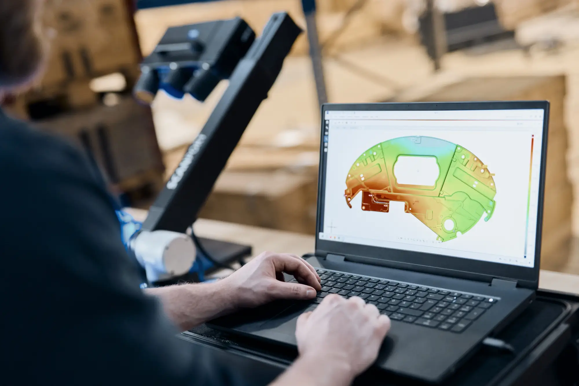 Scanned geometry being reconstructed into an engineering CAD model